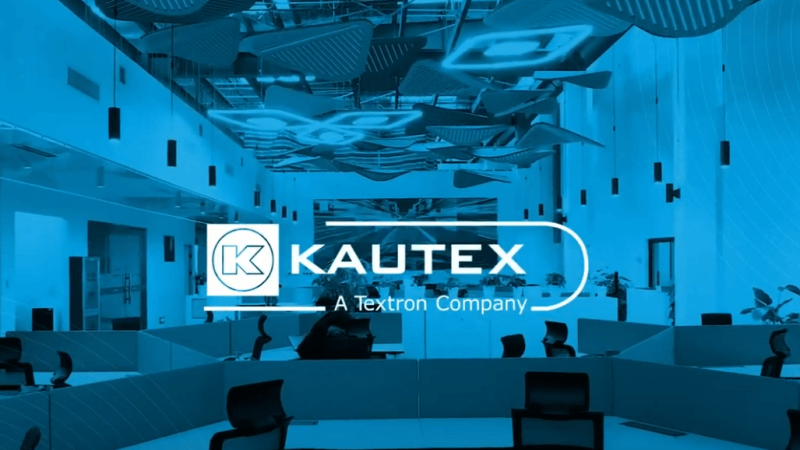 Kautex logo on a blue screen; overview of an office